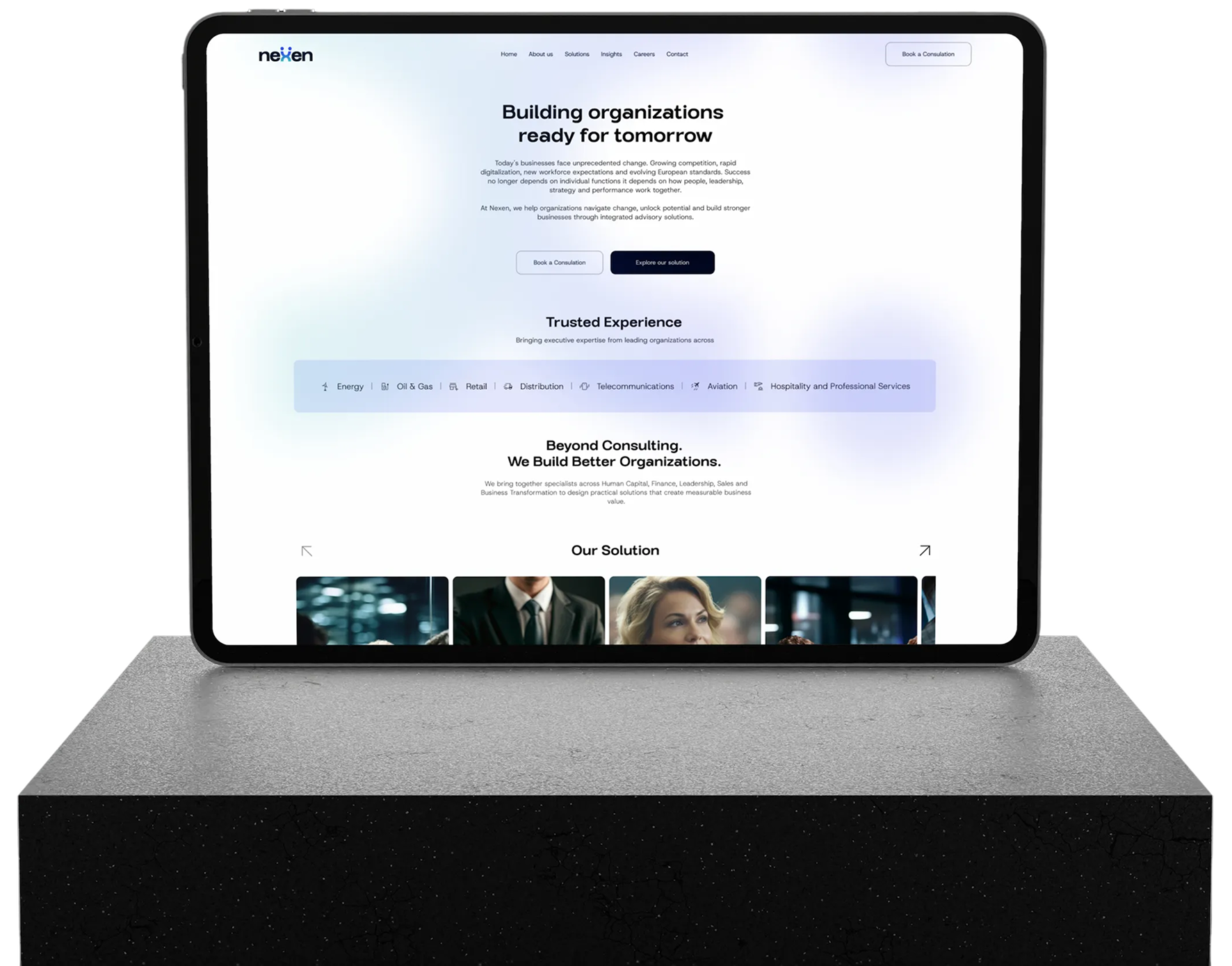 iPad showing the Nexen platform on a podium